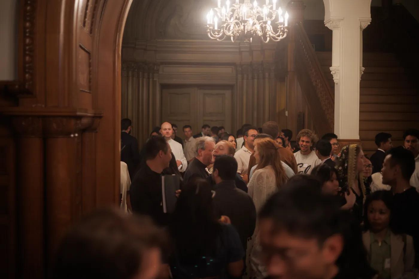 Young adults gathering for conversation after Mass